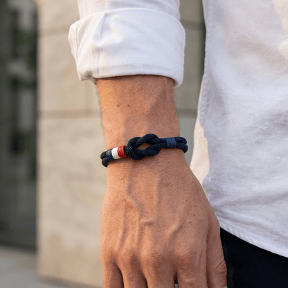 Porter™ Adjustable Cord Bracelet with Knot and French Flag Detail