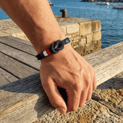 Porter™ Adjustable Cord Bracelet with Knot and French Flag Detail